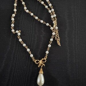 Elegant Gold toned and faux Pearl Necklace